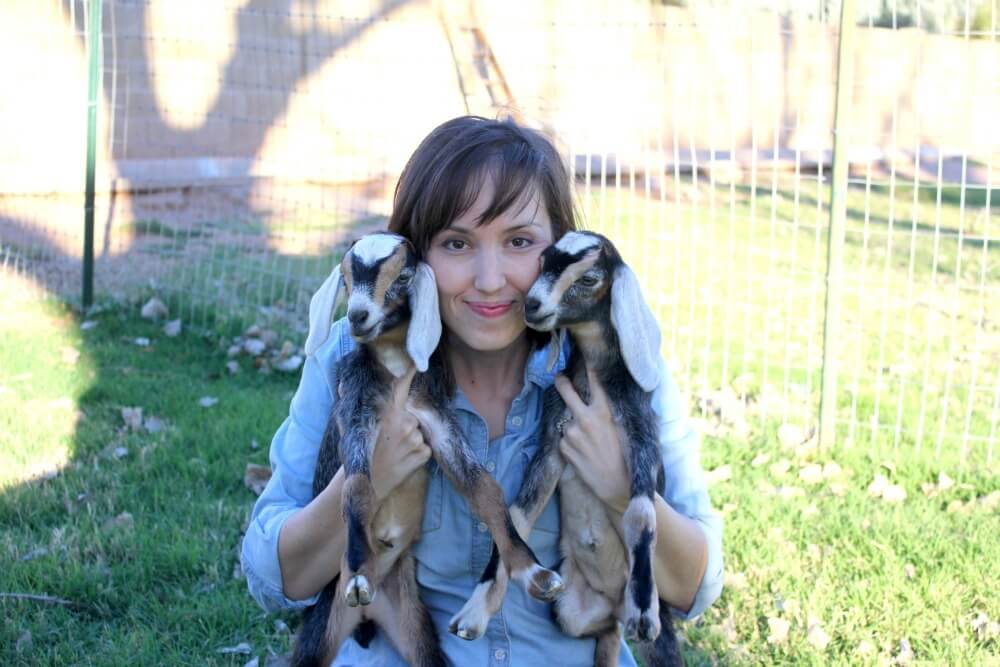 DaNelle Wolford with two baby goats