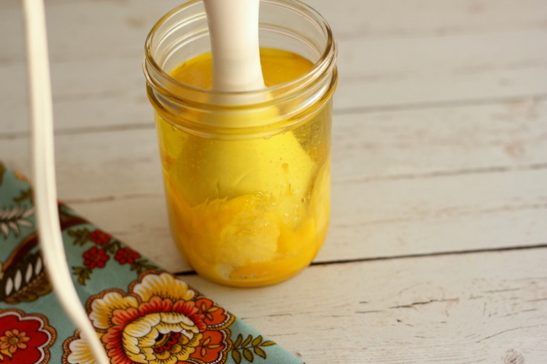 immersion blender mashing ingredients for homemade mayonnaise