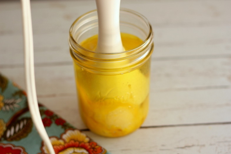 immersion blender in a jar with homemade mayonnaise ingredients