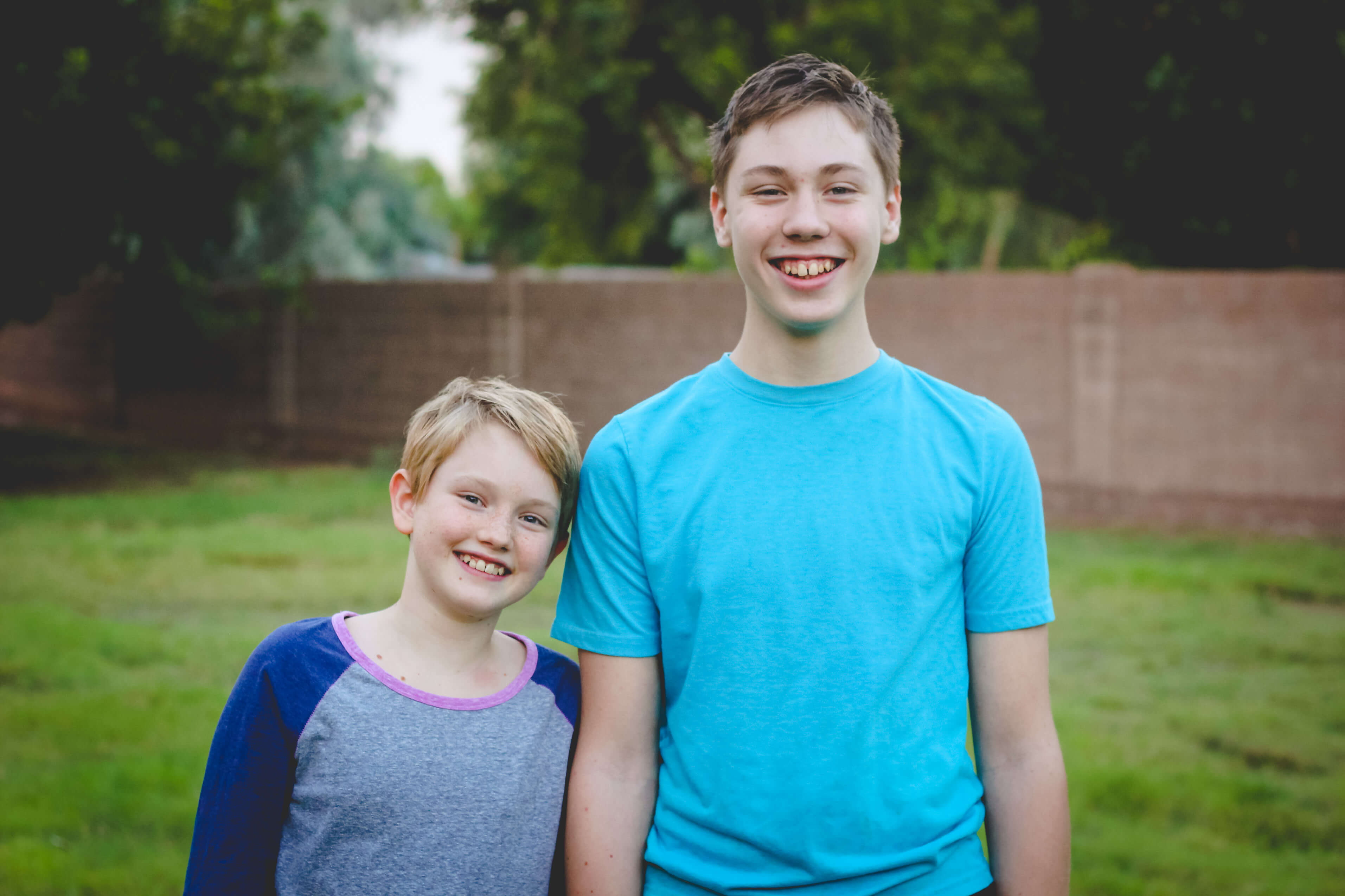 Relaxed homeschooled kids outside.