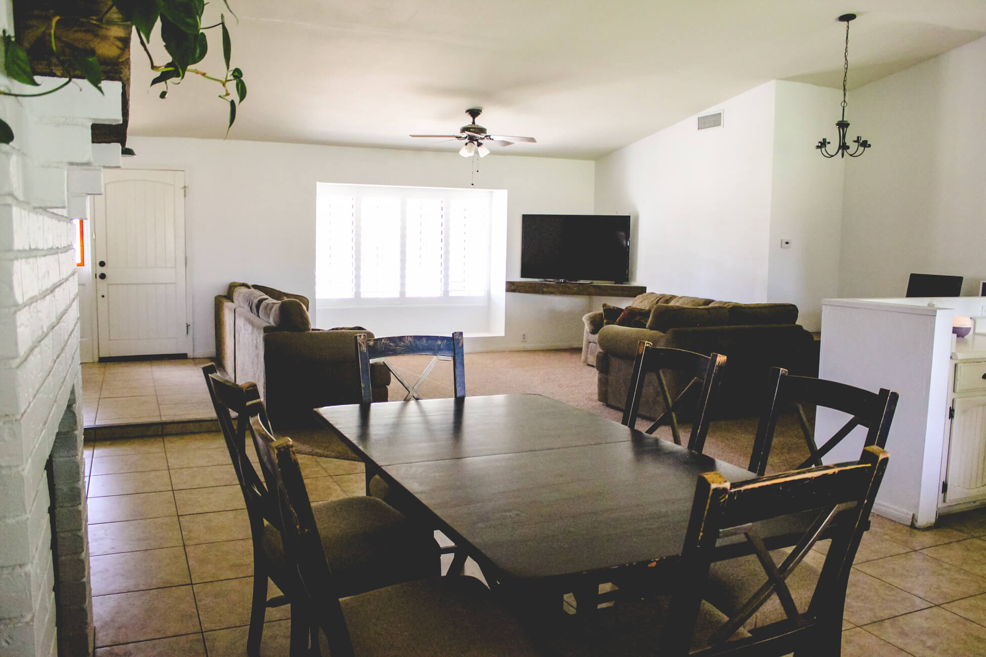 Large white family room in farmhouse