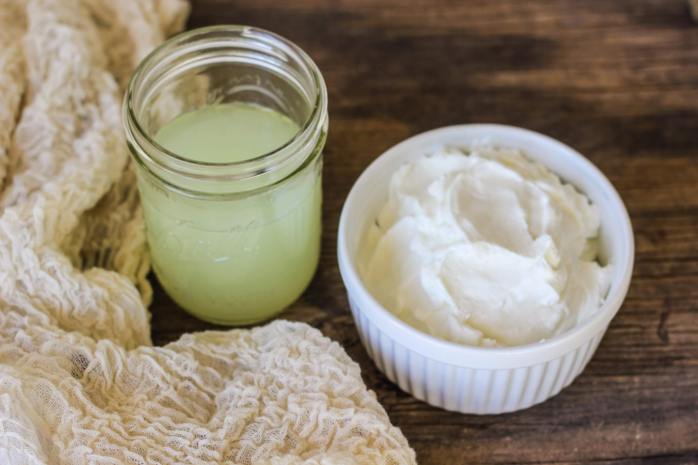 Homemade whey and yogurt on table